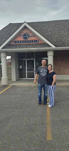 Owners at a new charcuterie shop