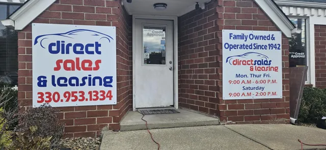 Storefront sign panels for a car dealer