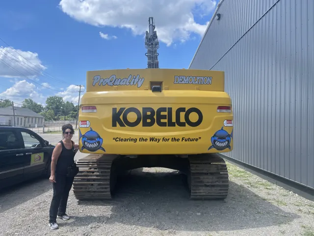 Branded graphics on an excavator