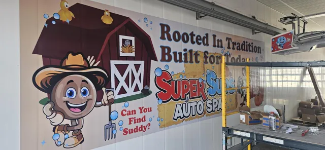 Character wall graphic for an auto spa
