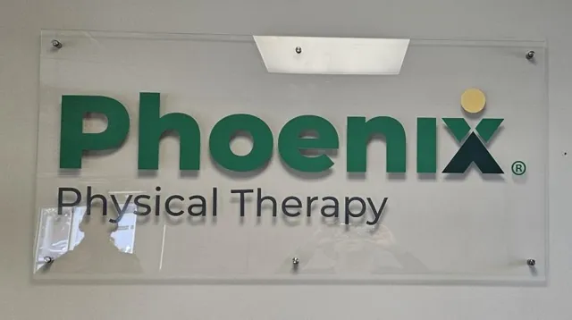 Clear acrylic wall sign for a physical therapy office