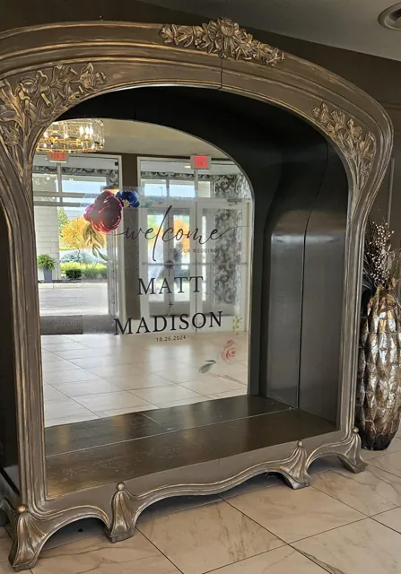 Welcome sign on an antique mirror