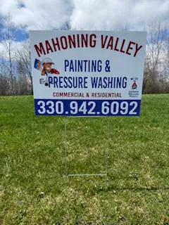 Yard sign for a painting and pressure washing company