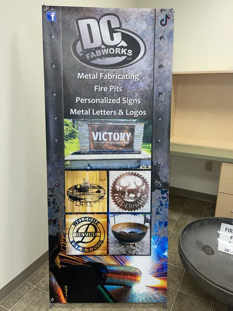 Metal fabrication banner stand