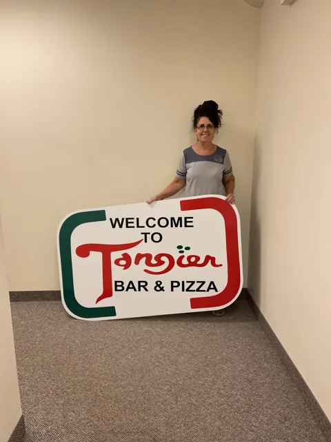 Custom shaped sign for a bar and pizza restaurant