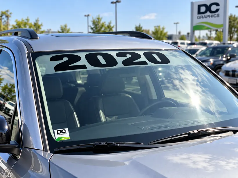 Windshield year decals sign by DC Graphics